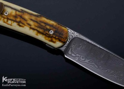 Brad Zinker Custom Knife Mammoth and Damasteel Damascus with Bronze Clip Front Flipper - Image 4