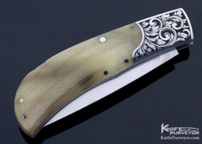 https://www.knifepurveyor.com/wp-content/uploads/2021/05/Steve-Hoel-Custom-Knife-Lynton-McKenzie-Engraved-Rams-Horn-Lockback-10624-Closed-416x297.jpg