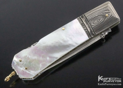 Barry Davis Custom Knife Mother of Pearl Lockback with Sole Authorship Damascus and Gold Liners. Pins and Bale