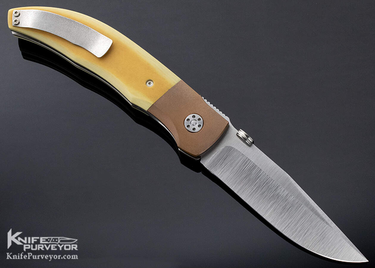 https://www.knifepurveyor.com/wp-content/uploads/2021/05/eddie-baca-ak-linerlock-westinghouse-micarta-copper-custom-knife-7807-reverse.jpg