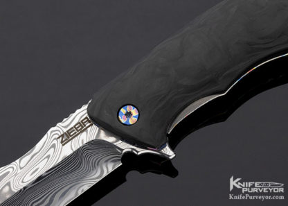 Michael Zieba Custom Knife S7 "Joker" with Marble Carbon Fiber & Custom Annodized Scales and Bronze Spacer - Image 5