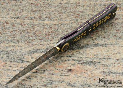 Howard Hitchmough Custom Knife Textured Blued Steel with Gold Nugget Inlays, Damasteel Damascus Dagger with Gold Bale and Pearl Inlaid Gold Pivot Linerlock - Image 5