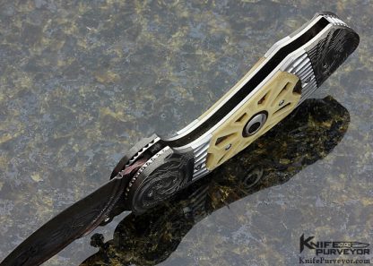 Andre Andersson Custom Knife Carved Blued Mosaic Damascus with Carved, Stippled and Pierced Walrus "Night and Day" Lockback Folder - Image 5