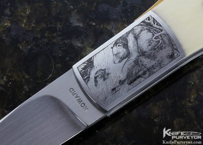 Durvyn Howard Custom Knife Pre-ban Elephant Ivory Midlock with 18Kt Gold Escutcheon and 18Kt Gold Pins "Bull and Bear" Engraved by Jon Robyn - Image 2