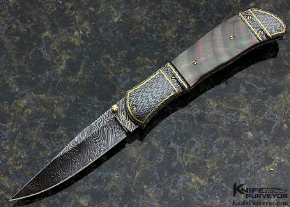 John W. Smith Custom Knive Blacklip Tahitian Pearl Shell Linerlock with Blued Sole Authorship Damascus with 24 Kt Gold Inlays