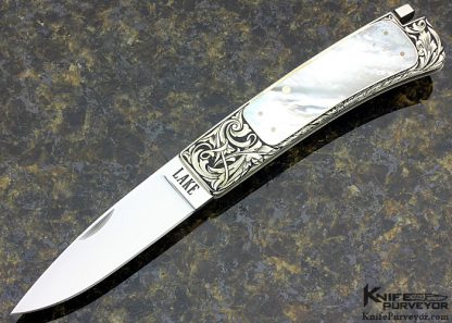 Ron Lake Custom Knife Mother of Pearl Interframe Tail Lock Engraved by Ron Skaggs