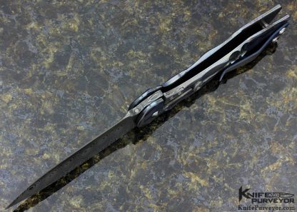 Juergen Schanz Custom Knife Damasteel with Textured Stainless Steel Laminted Titanium Model 2 Drop Point Pocket Knife - Image 5