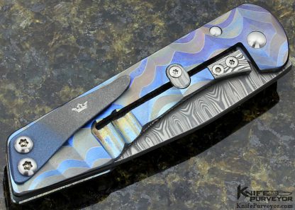 Juergen Schanz Custom Knife Damasteel with Textured Stainless Steel Laminted Titanium Model 2 Drop Point Pocket Knife - Image 3