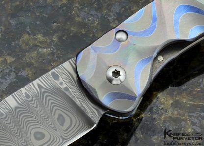 Juergen Schanz Custom Knife Damasteel with Textured Stainless Steel Laminted Titanium Model 2 Drop Point Pocket Knife - Image 2