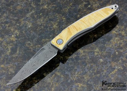 Chris Reeve Mnandi With Box Elder Burl & Raindrop Damascus Frame Lock