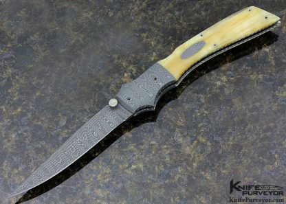 Charlie Dake Custom Knife Fossilized Walrus and Mike Norris Stainless Damascus Midlock D/A Auto