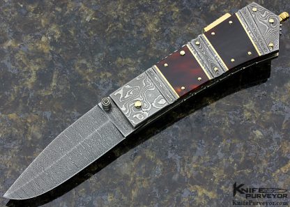 Barry Davis Custom Knife Small Triple Damascus Bolster with Amber and Gold Pins, Bale, and Back Spacer Lockback