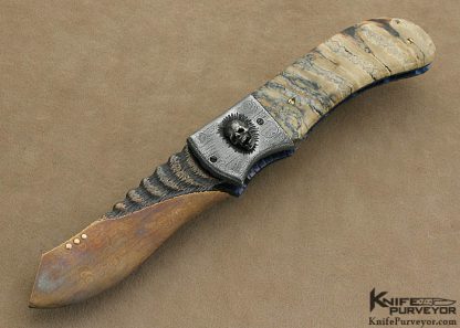 Arthur Whale Custom Knife Blued Carved Damascus, Damascus Bolsters with Steel Skulls  Recurved Utility Linerlock