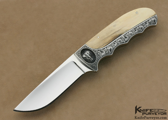 https://www.knifepurveyor.com/wp-content/uploads/product_images/dholder_ivory_elephant_engraved_finger_groove_hunter_open_L.jpg