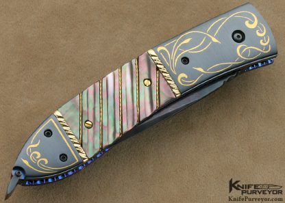 Jim and Joyce Minnick Custom Knife Blued Damascus with 24Kt Gold Inlaid Blued Steel Bolsters and Fluted Black Lip Tahitian Pearl Shell Drop Point Linerlock - Image 3