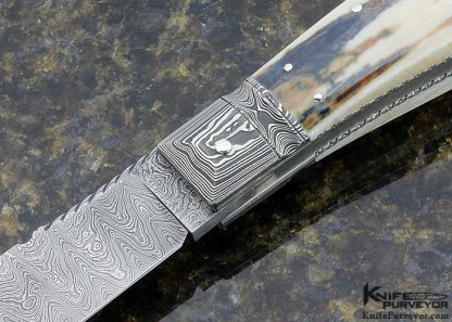 Jim Schmidt Custom Knife SCHMIDT 7/22/85  #70 "PISWHISTLER" Sole Authorship Damascus & Fossilized Walrus Bale Lock Folder - Image 2