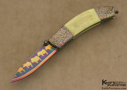 Johan Gustafsson Custom Knives Blued Sole Authorship Mosaic Damascus & Premium Amber "Baby Rhino" Linerlock