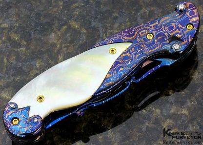 Suchat Jangtanong Custom Knife Robert Calcinore Mosaic Damascus and 6A14v Annodized Titanium with Yellow Lip Pearl Linerlock - Image 4