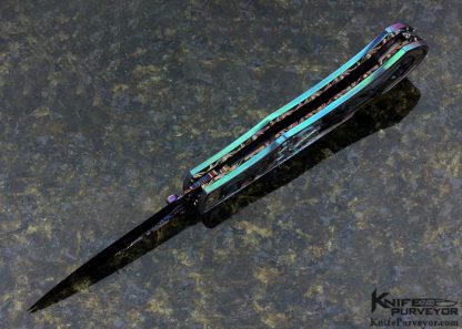 Suchat Jangtanong Custom Knife Carved Anodized Stippled Titanium with Blued Robert Calcinore Mosaic Damascus and Carved Tahitian Blacklip Pearl Lockback - Image 6