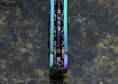 Suchat Jangtanong Custom Knife Carved Anodized Stippled Titanium with Blued Robert Calcinore Mosaic Damascus and Carved Tahitian Blacklip Pearl Lockback - Image 7